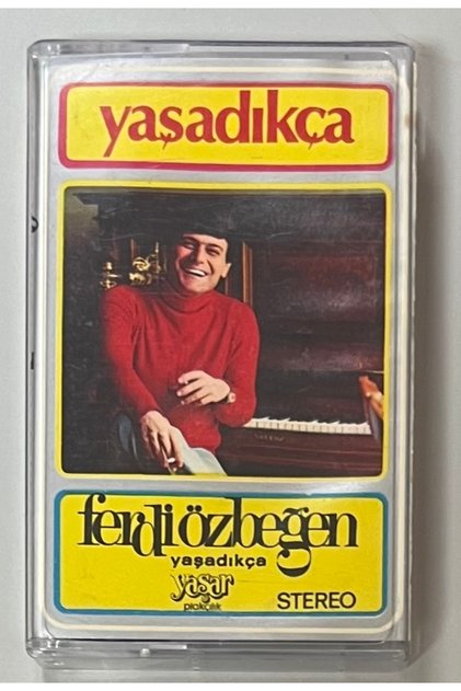 Ferdi özbeğen cassette as we live (paper printing of the period)