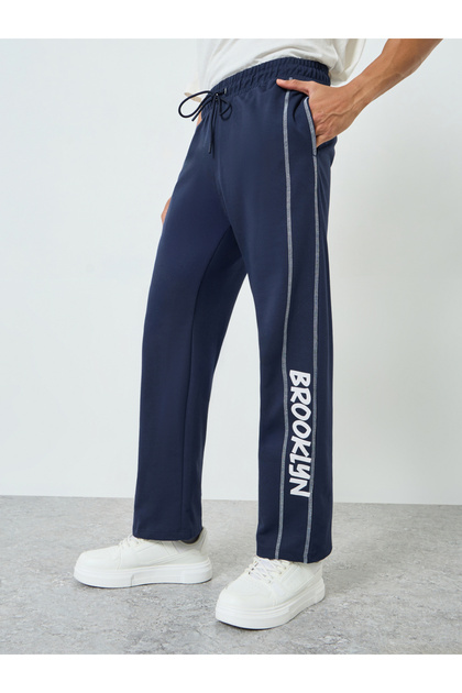 Men Navy Blue Oversized Side Panel Print Joggers