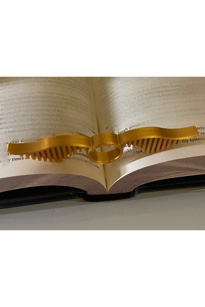 حامل الكتب وحامل الصفحات - تصميم حلقة على شكل السنيتش الذهبي بتصميم هاري بوتر