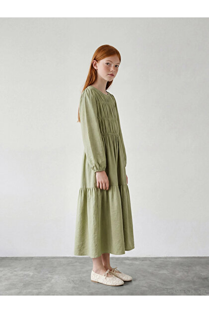 فستان LCW Girls Studio Green بياقة دائرية ورباط للفتيات