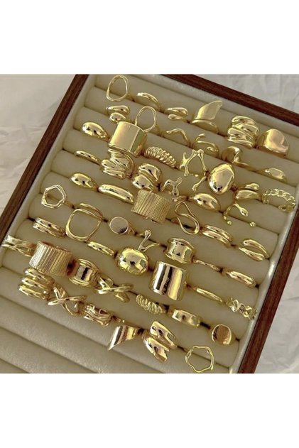 A collection of modern women's rings with an asymmetrical geometric design and a stylish, contemporary touch – 15 pieces without box