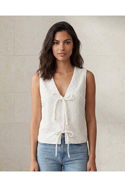 Women Ivory Textured Embroidered Waistcoat
