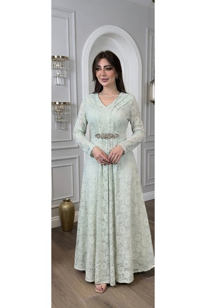 A modern dress with geometric patterns and lace - perfect for special occasions - available now with immediate shipping