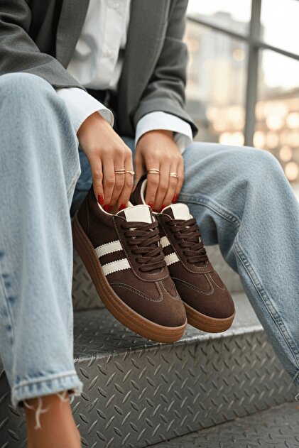 lacoste brown dress shoes Brown leather Lacoste sneakers with a clean, low-profile silhouette. Crafted from smooth premium leather with subtle perforated detailing on the toe and a signature crocodile logo on the side. Finished with a
