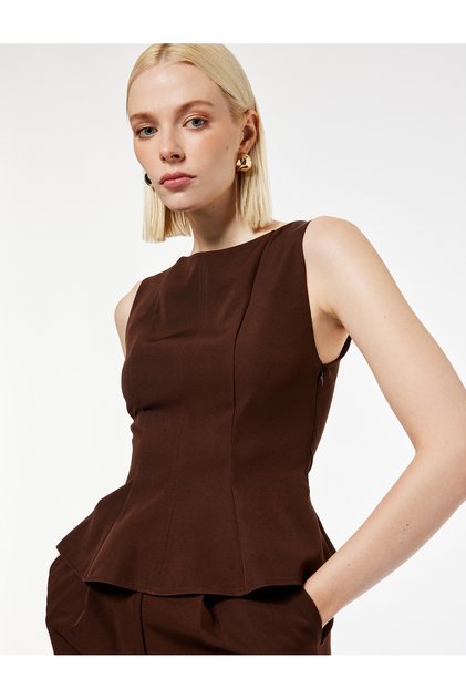 Crew Neck Sleeveless Peplum Blouse