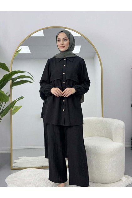 بدلة بنطلون مفصلة التصميم بأزرار باللون الأسود