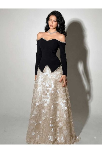 Black Off-The-Shoulder Dress with Long White Skirt and Sparkling Sequins.
