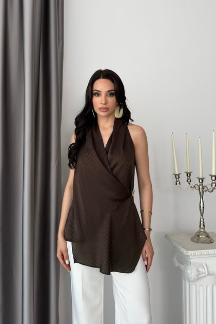 Brown double-breasted blouse with buckle detail and halter neck