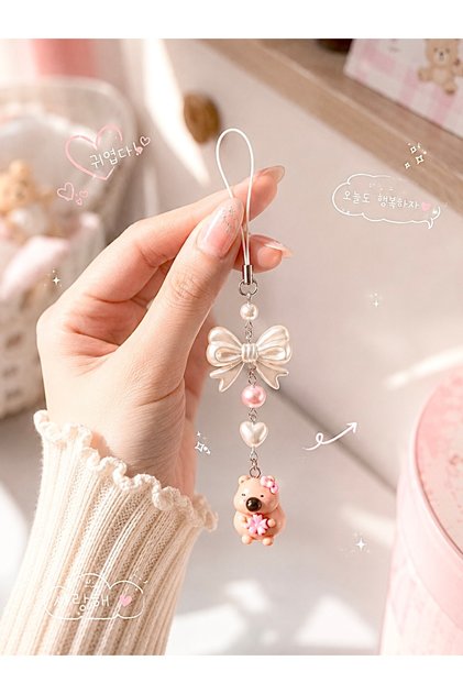 🌸 Kapibara Telefon Charmı Kurdeleli Pembe Ayıcık Askı – Kamera Charmı, Telefon Süsü, Çanta Aksesuarı, Kawaii Kore Tarzı