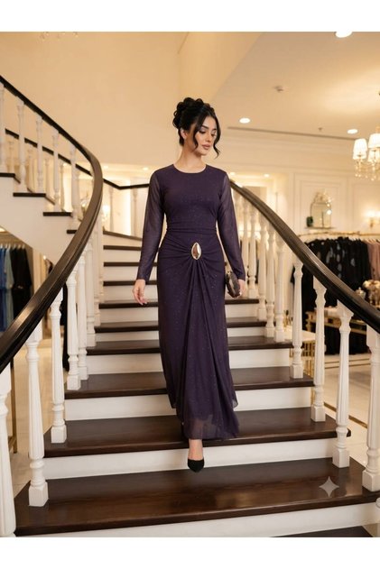 The Purple Dress Is Embellished with Sparkling Embroidery.
