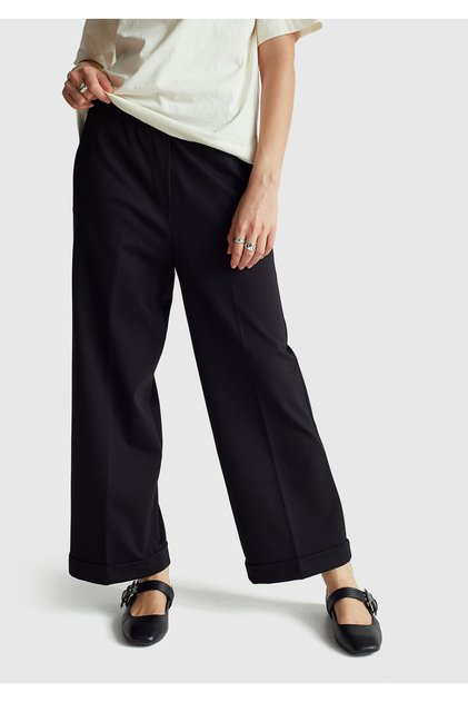 Women's black viscose blend elastic waist curled leg pants