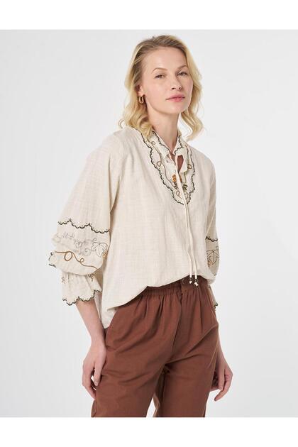 Ethnic Pattern Blouse with Lace-Up Collar Cream