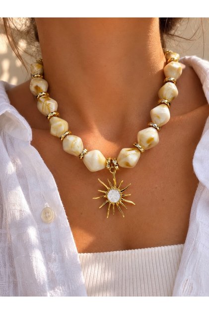 Cream Color Bead Necklace with Sun Figure