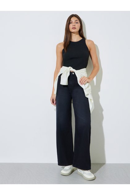 بنطلون جينز أسود واسع الساق بخصر مرتفع وتصميم باهت