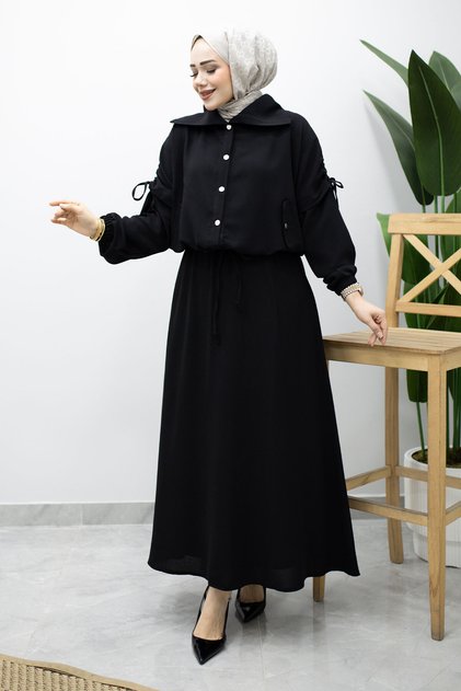 Set cu fustă și detaliu elastic la mâneci TSD260210 Negru