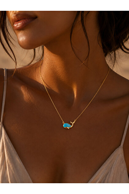 Elegant Gold Necklace with Turquoise Whale Figure 🐋