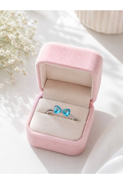Elegant Silver Color Adjustable Women's Ring with Blue Stone Detail