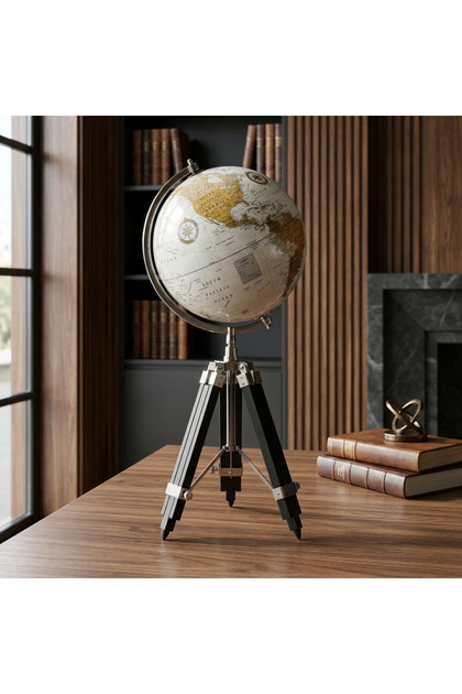 A luxurious decorative globe on a tripod stand, blending classic sophistication with modern elegance for any office or living space.