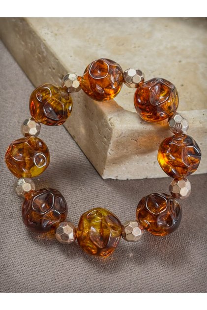 Carved Round Cut Acrylic Resin Bracelet with Faceted Sphere and Gold Apparatus