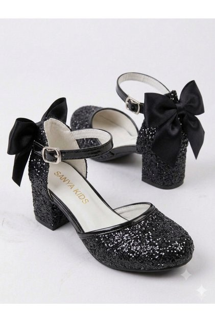 Pantofi de seară eleganți, confortabili, cu toc, cu fundă, de culoare neagră, strălucitori, pentru fete.