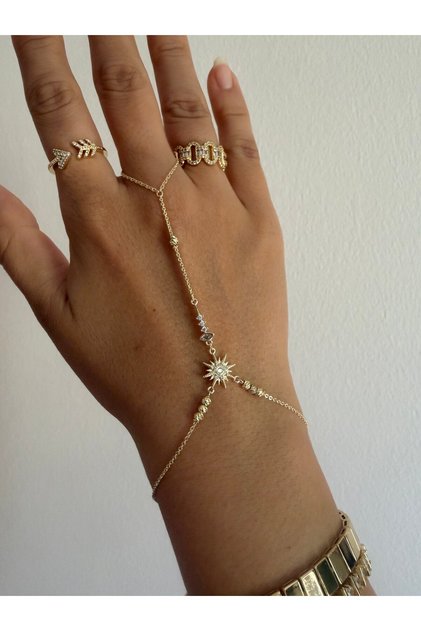 Light gold renk,altın kaplama kuzey yıldızı ve dorika detayları olan mükemmel tasarım şahmeran