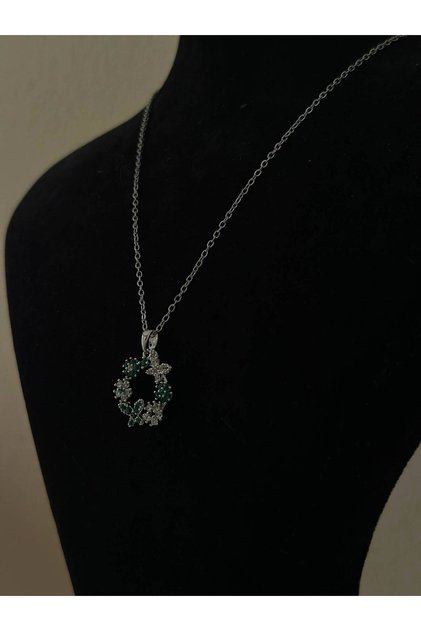 Elegant Necklace with Green Stones and Flower Figures