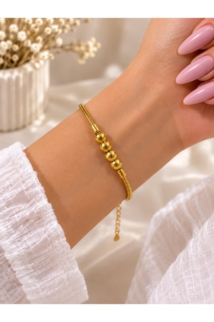 Bracelet with Ball Detail in Steel Gold Color