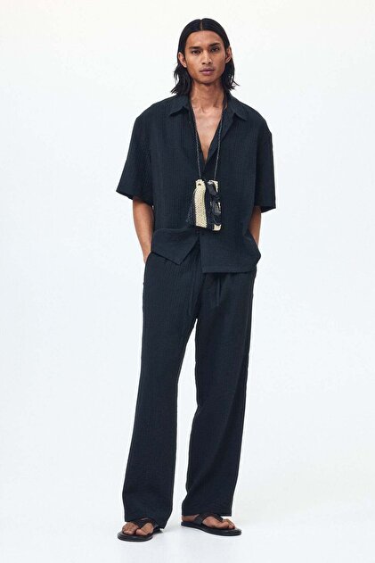 Relaxed Fit textured trousers