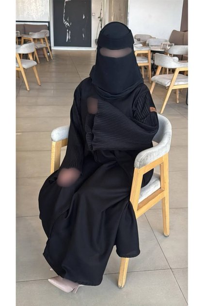 Al Buruj Abaya with pleated sleeves, luxurious flared abayas, modern Gulf style.