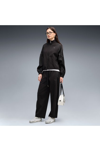 Her barrel leg trousers