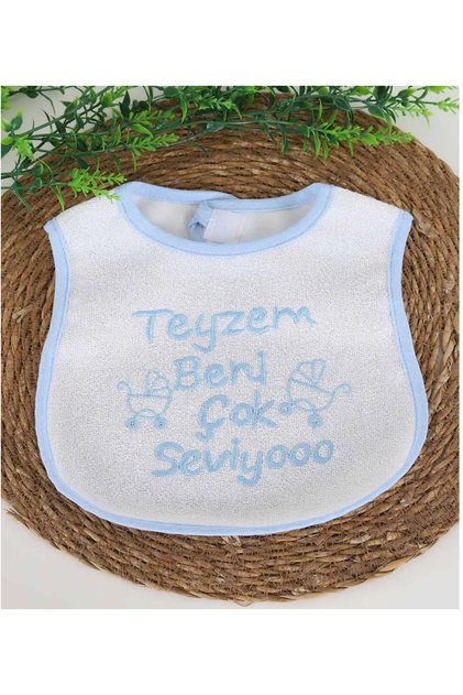 Blue Baby Food Bib with the Words "My Auniloves Me Very Much"