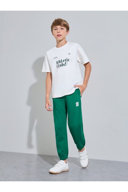 Teen Boys Off White Graphic Print T-Shirt and Green Joggers Set