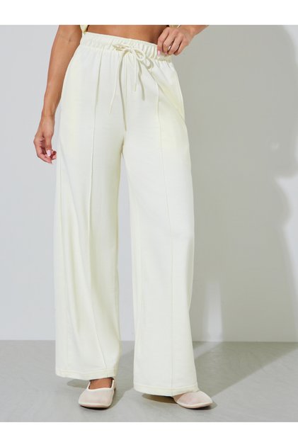 Off White Solid Pintuck Details Wide Leg Joggers
