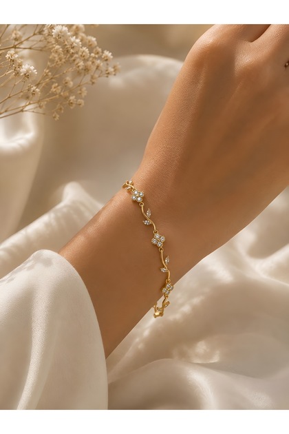 Çelik Gold Renk Geometrik Çerçeve Ve Yaprak Motifli Zirkon Taşlı Bileklik