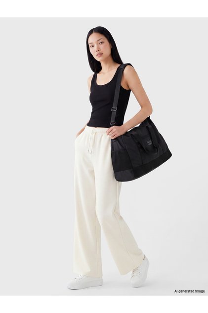 Pantaloni de trening de damă cu talie elastică și picior larg