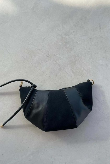 Bag with Segmented Handle and Knotted End