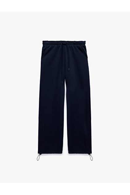 Comfortable Fit, Lace-Up Waist, Pockets, Elastic Cuffs, Barrel Sweatpants