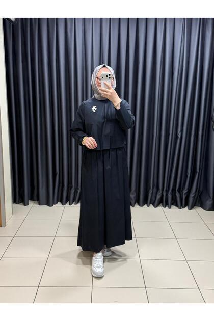 KADIN LACİVERT İKİ PARÇA GÖRÜNÜMLÜ KATLI ELBİSE