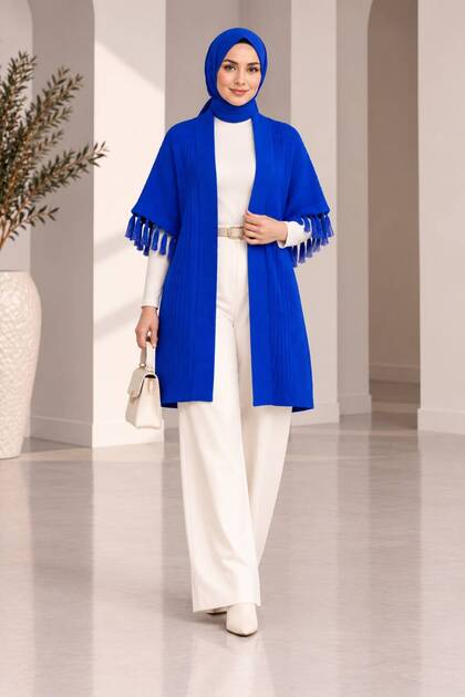 Women's comfortable fit tweed poncho cardigan with tassel detail on the sleeves