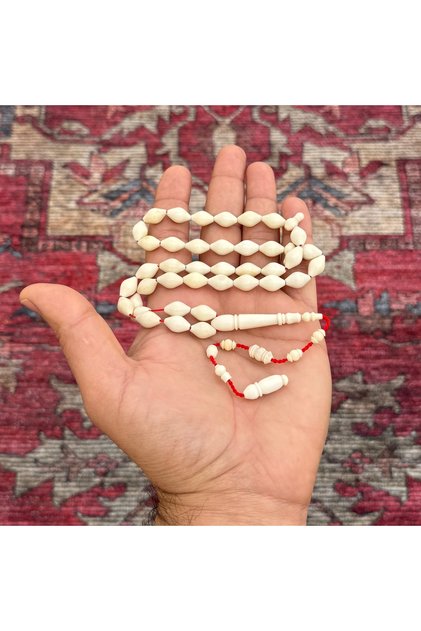 سبحة من عظم الجمل من الخامات الطبيعية عدد الخرز 39 مقاس الخرز 8*12ملي