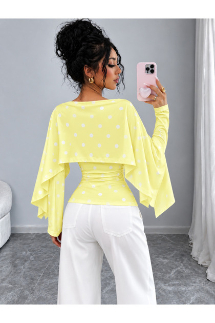 White Women's Blouse with an Elegant Cape Detail, Drawstring Waist Design, and Stylish Silhouette; an Ideal Choice for Everyday Outfits and Special Events.