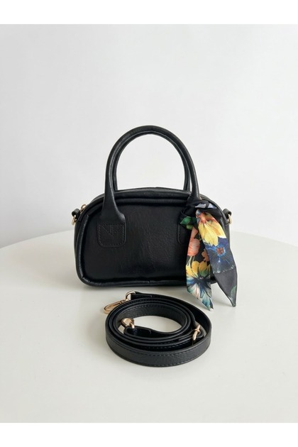 Black color hand and shoulder bag with scarf model.