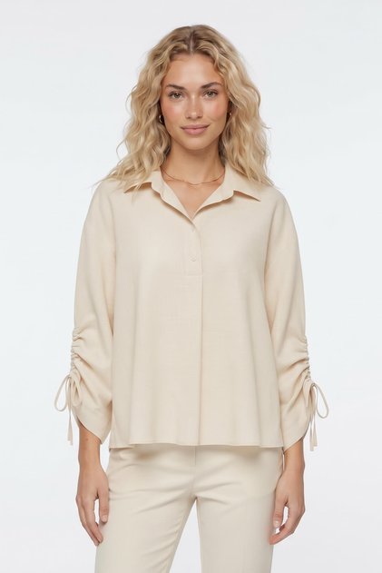 Cream Oversized Blouse with Ruffle Detail on the Sleeves
