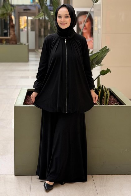 طقم سترة وبنطلون بتفاصيل مضلعة لامعة وسحاب أمامي