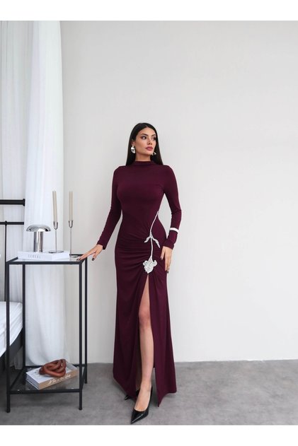 Long dress with slit and stone accessories