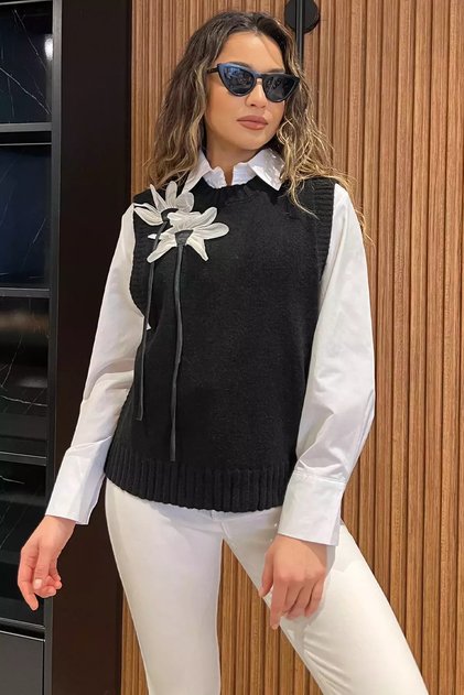 Women's knit sweater with floral detail