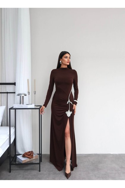 Long dress with slit and stone accessories