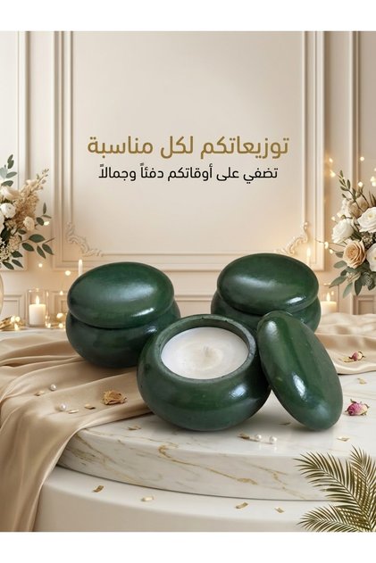 شمعة معطرة في وعاء أخضر بغطاء