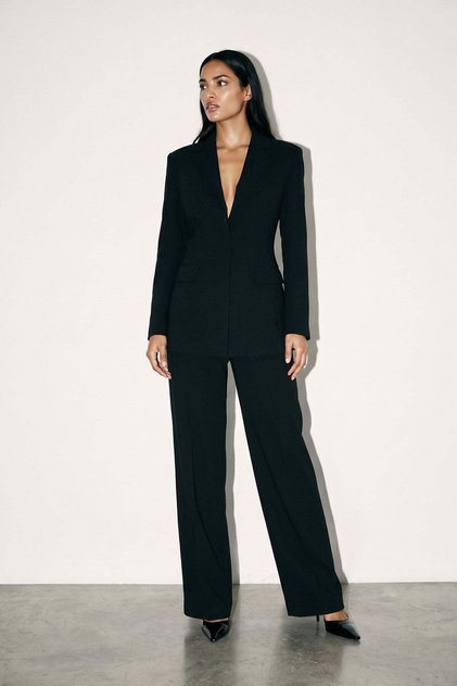 Black Jacket with Pocket Detail and Loose Fit Pants with Button Details