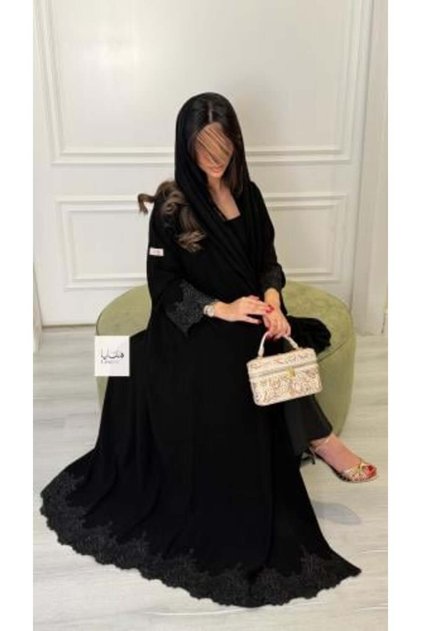 Maysam Abaya Made of Royal Crepe Fabric with Embroidered Trim at the Bottom of the Abaya and on the Sleeves.